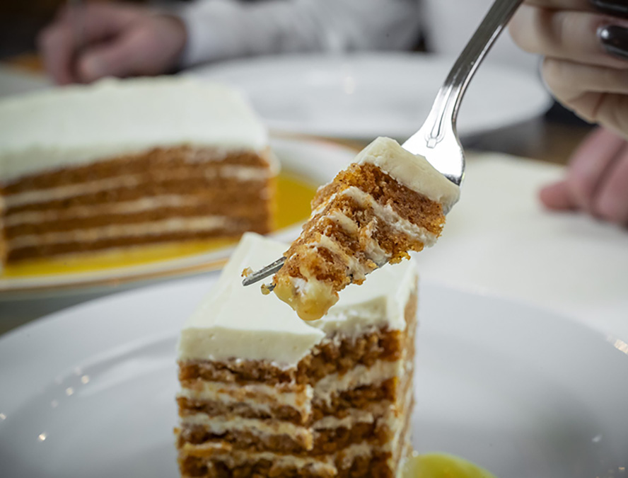 A close up of Ocean Prime's five layer carrot cake.