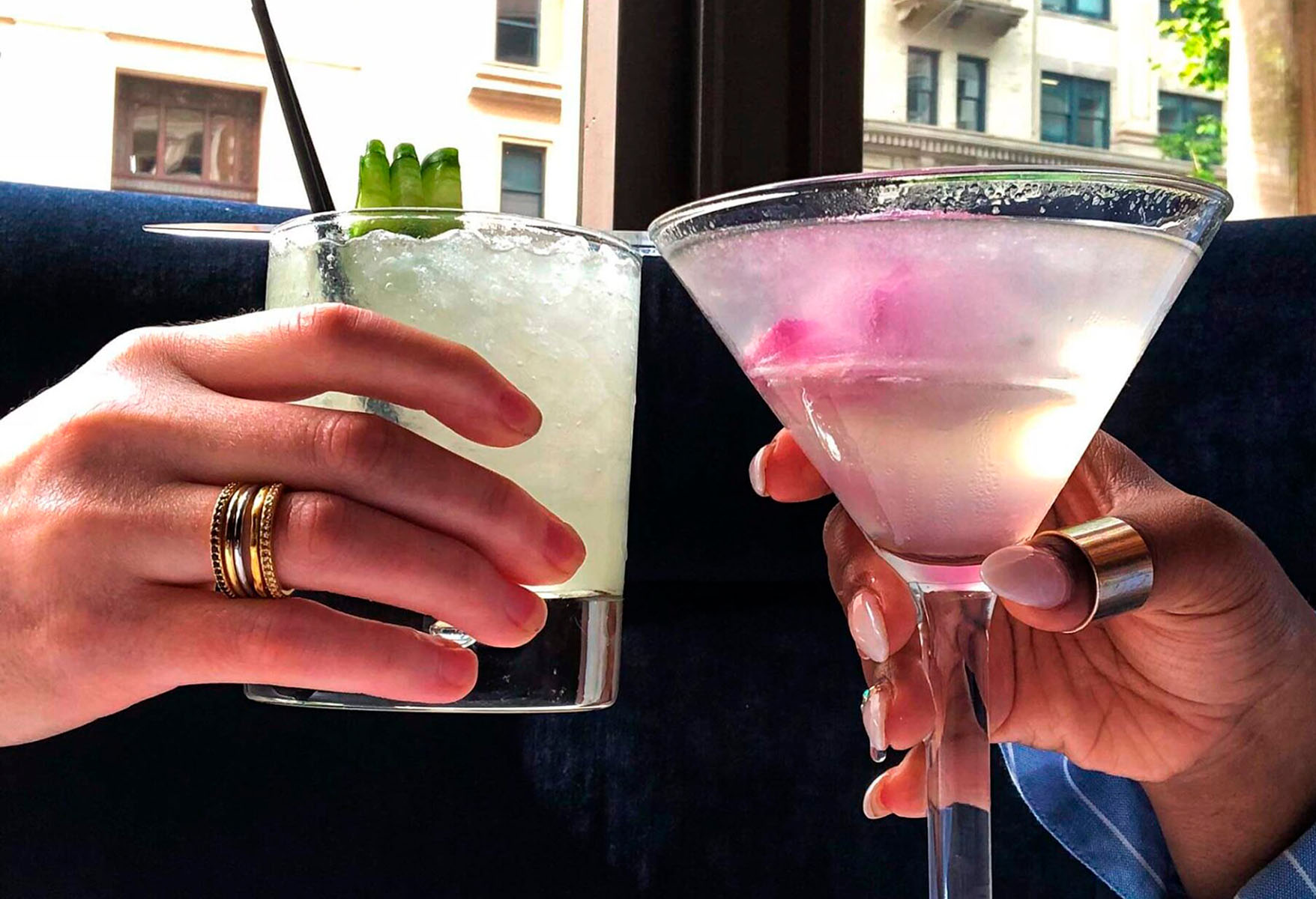 Two guests enjoy cocktails from Ocean Prime.